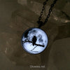Black Raven in Tree with Real Full Moon Glow Necklace