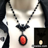 Bat necklace #3 with red Opal Glow Stone