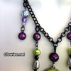 Chartreuse Glow Opal Midnight Skulls Necklace