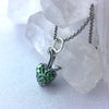 Enchanted Apple Caged Glow Locket ™