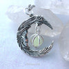 Crescent Moon Man Face With Caged Orb Glow Locket Silver