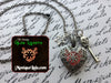 Smiling Skeleton Key Charm