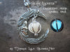 Crescent Moon Man Face With Caged Orb Glow Locket Silver